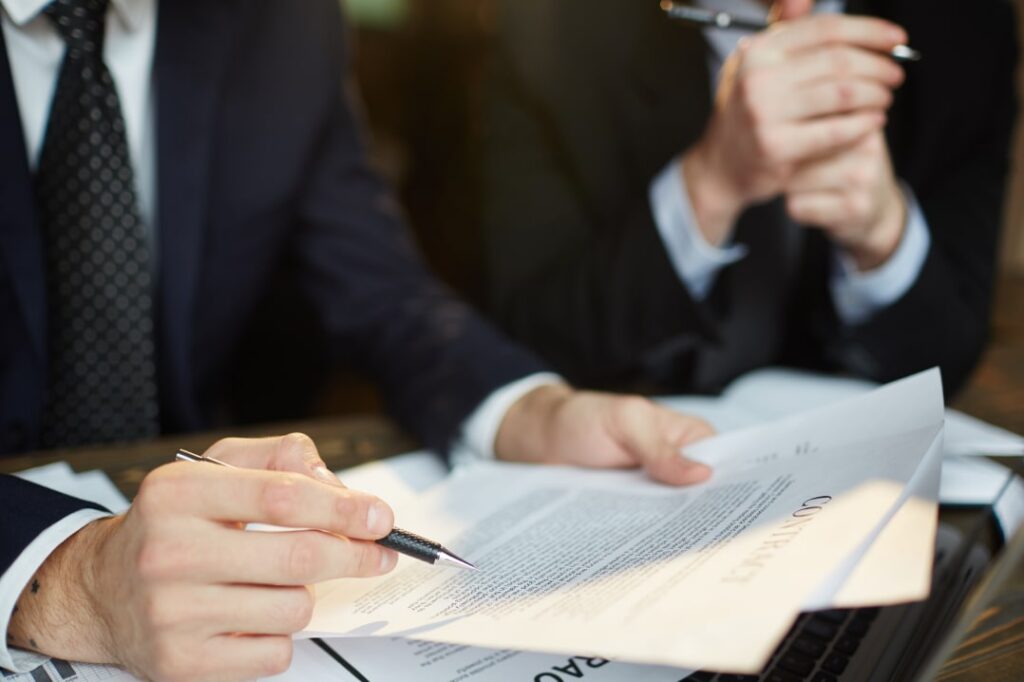 businessman reading contract 1 1 min