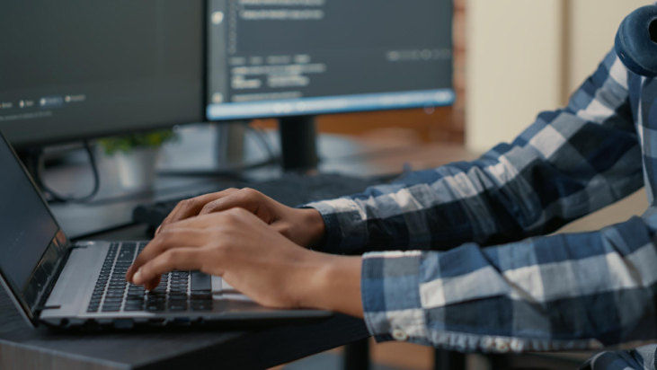 closeup programer hands typing machine learning code laptop keyboard front computer screens with programming interface system engineer writing algorithm online cloud computing 1